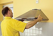 Как установить вытяжку на кухне над плитой: пошаговая инструкция с фото